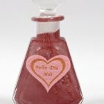 Botella rosa con corazón
