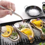 Pinzas de cocina curvas de acero inoxidable de 24 cm