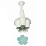 Cortador de nomeolvides con eyector